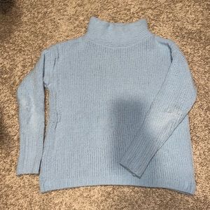 light blue sweater